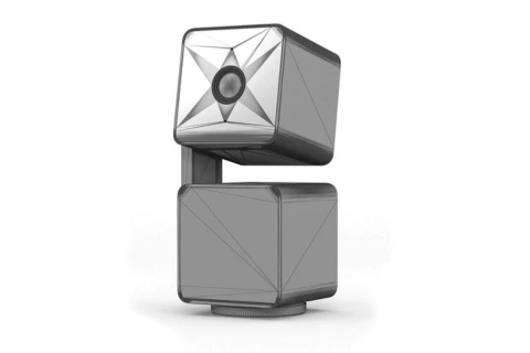 3D product modeling process displaying a wireframe version of a camera for electronics design.