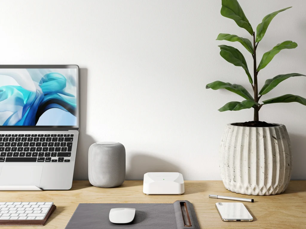 A workspace setup with gadgets in a 3D rendering in consumer electronics.