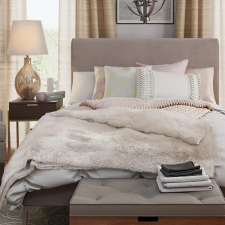 Cozy bedroom render with soft textures and warm tones for home furnishings.