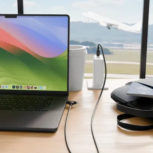 A laptop charger featured through 3d product rendering services in the consumer electronics field.